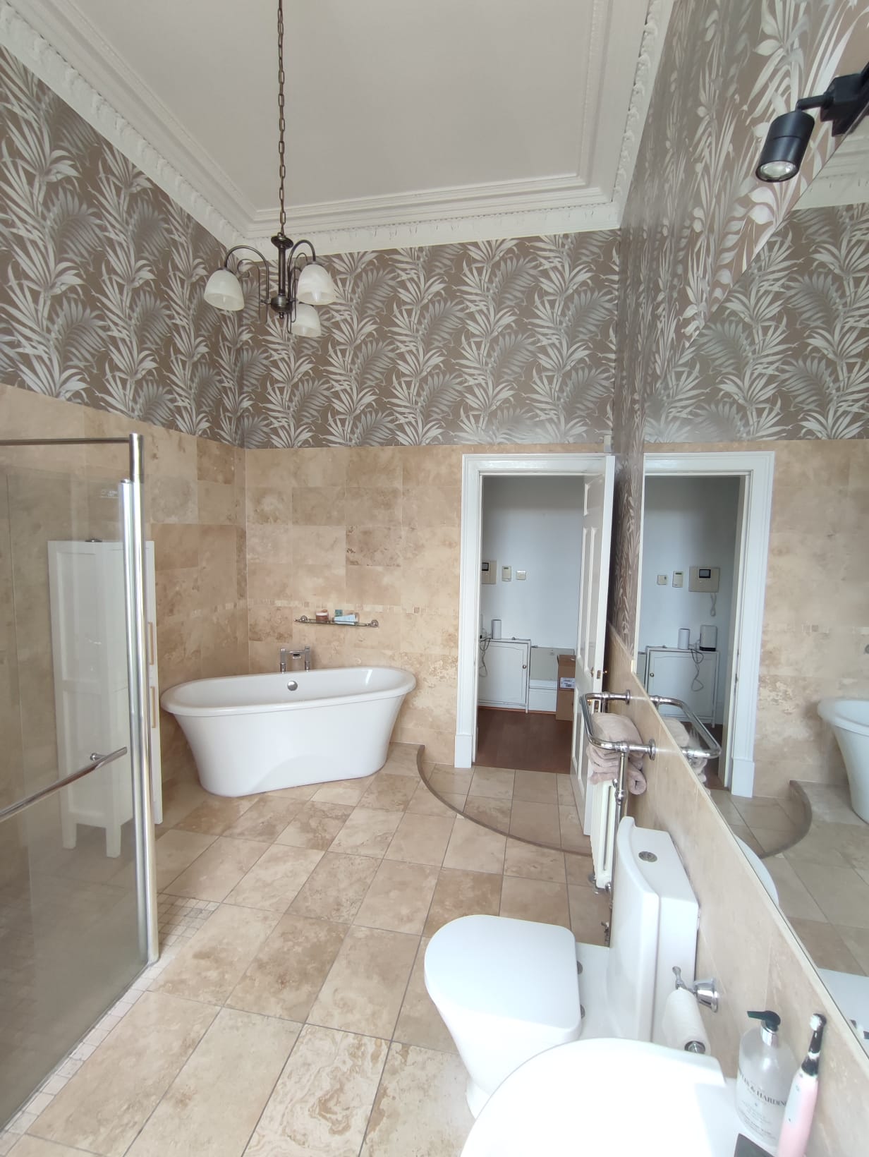 Bathroom wallpaper pattern matching around fittings in Edinburgh