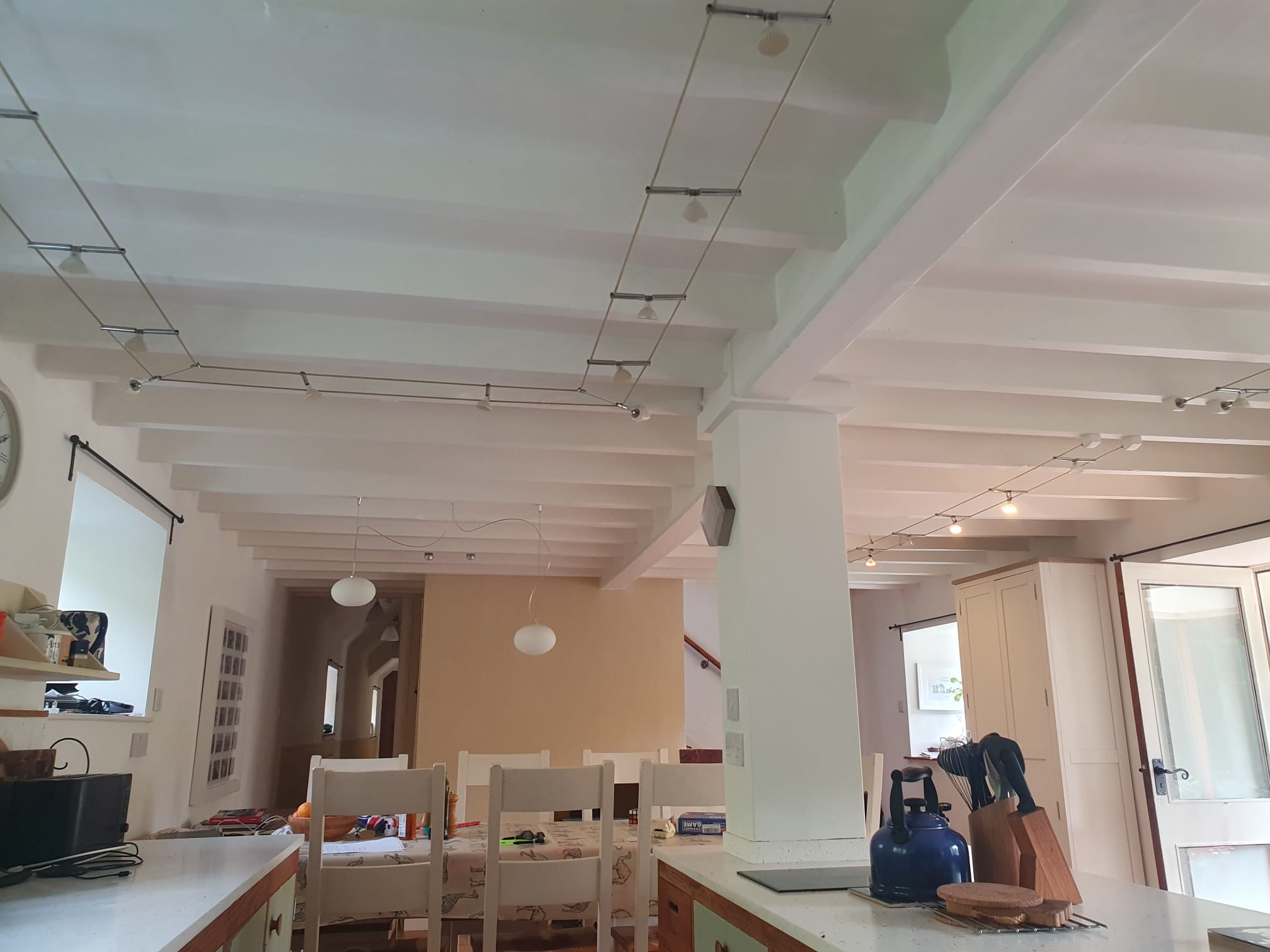 Painted timber pillar and ceiling above the cottage dining area